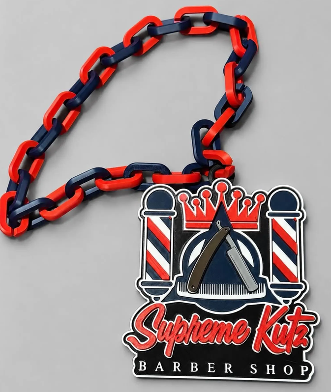 Supreme Kutz Barbershop custom logo chain with red and navy links